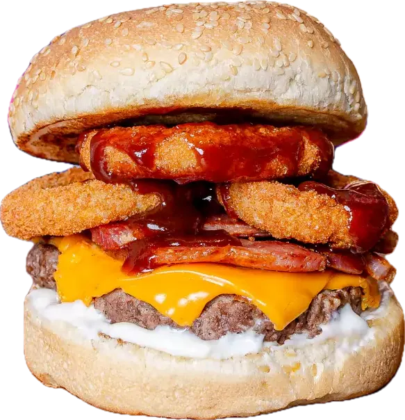 Onion Bacon: Hambúrguer artesanal de 140g, queijo cheddar derretido, bacon, onion rings, molho barbecue e maionese defumada, no pão de gergelim.